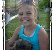 Girl Holding a Shih Tzu